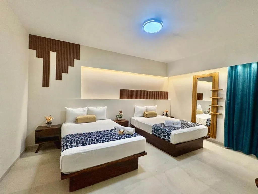 Hotel Taxaha guest room gallery view 1