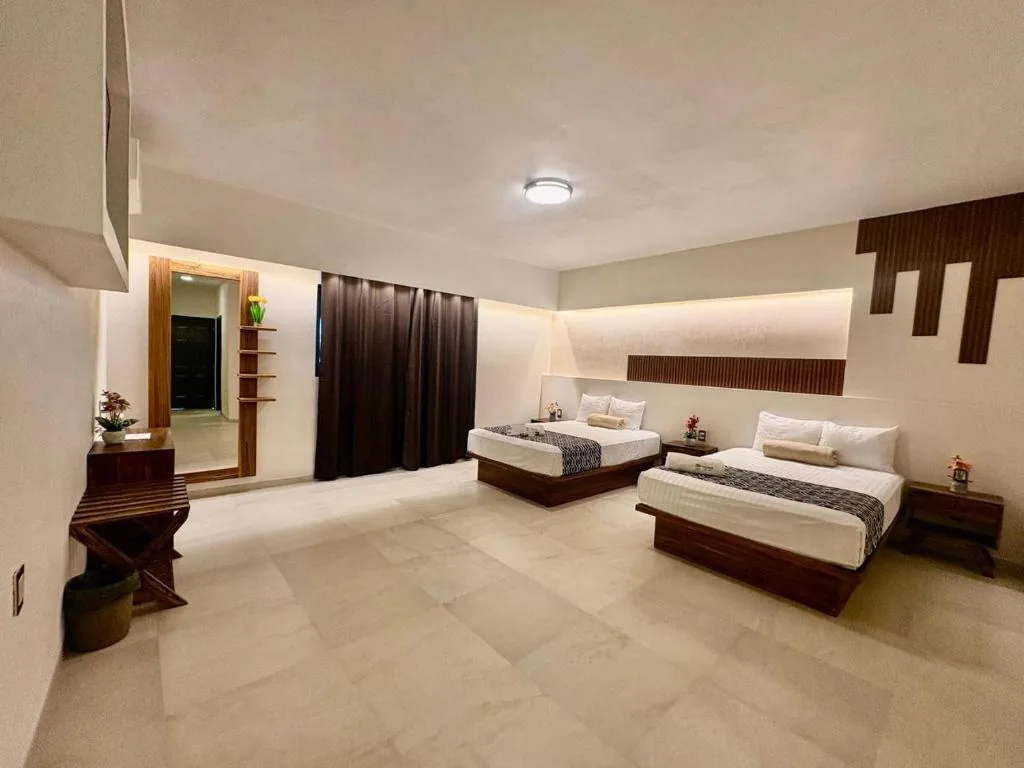 Hotel Taxaha guest room gallery view 3